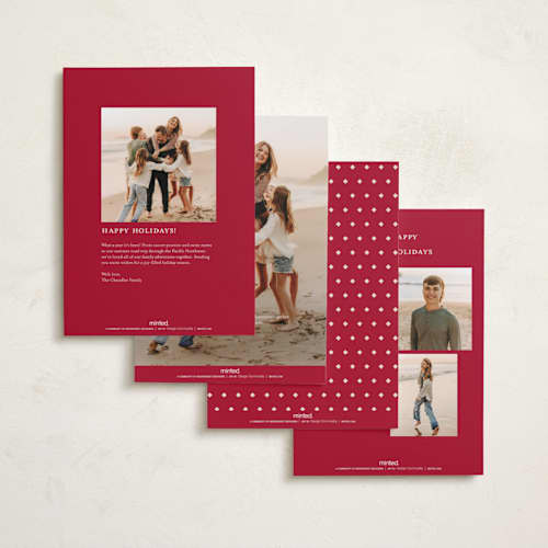 This is a poinsettia foil pressed holiday cards with foil pressed by Carolyn MacLaren called vintage bevel printing on recycled smooth signature in standard
