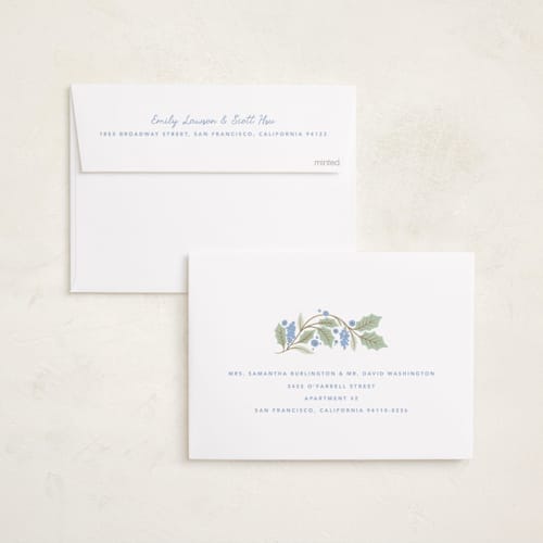 This is a bluebelle foil pressed holiday cards with foil pressed by Kristen Smith called gilded holly border printing on recycled smooth signature in standard