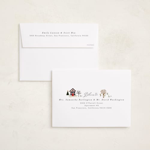 This is a taffy foil pressed holiday cards with foil pressed by Hannah Williams called winter village oval printing on recycled smooth signature in standard