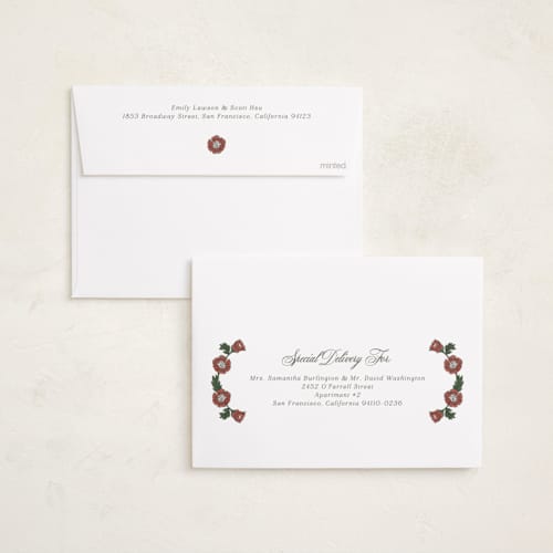 This is a poinsettia foil pressed holiday cards with foil pressed by Jen Owens called monogram nouveau printing on recycled smooth signature in standard