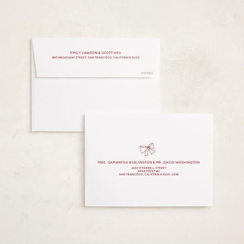 This is a poinsettia foil pressed holiday cards with foil pressed by Inkblot Design called good cheer printing on recycled smooth signature in standard
