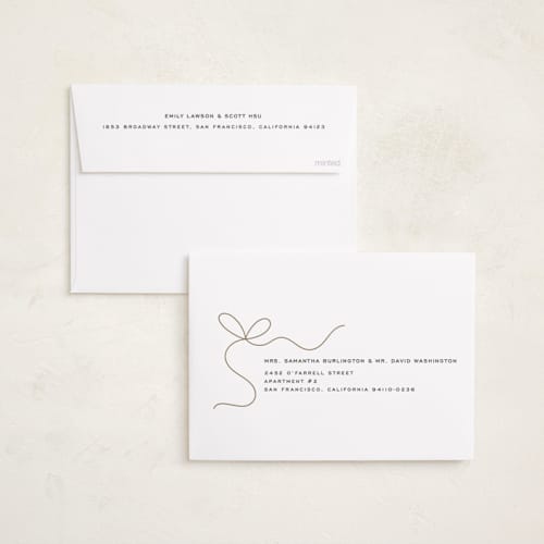 This is a winter foil pressed holiday cards with foil pressed by Yuliya Evseeva called little bow printing on recycled smooth signature in standard