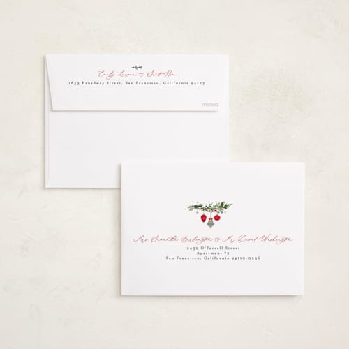 This is a holly berry foil pressed holiday cards with foil pressed by Susan Moyal called pine garland printing on recycled smooth signature in standard