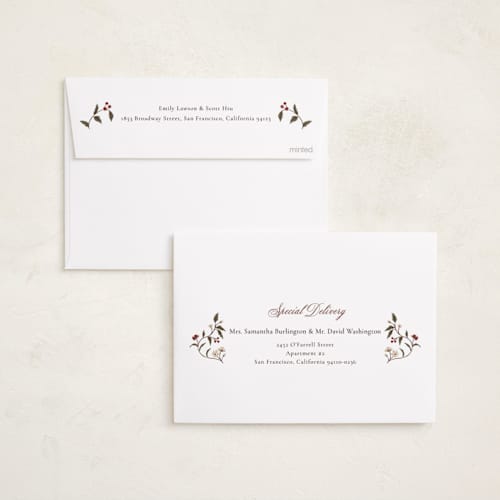 This is a wine foil pressed holiday cards with foil pressed by Elly called a gilded season printing on recycled smooth signature in standard