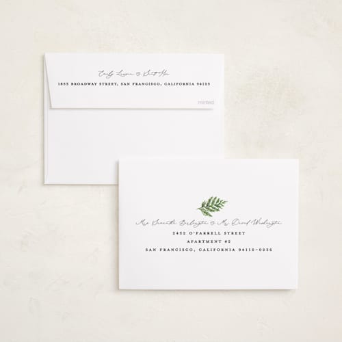 This is a snow gloss press holiday cards with gloss press by Brooke Chandler called joy greenery printing on signature in standard