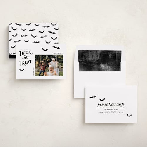This is a onyx halloween party invitations cards with standard by Hooray Creative called trick-or-treat printing on recycled smooth signature in standard
