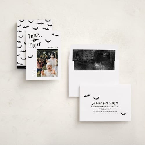 This is a onyx halloween party invitations cards with standard by Hooray Creative called trick-or-treat printing on recycled smooth signature in standard