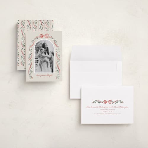 This is a peppermint petite holiday cards with standard by Leah Bisch called arch garland printing on recycled smooth signature in petite