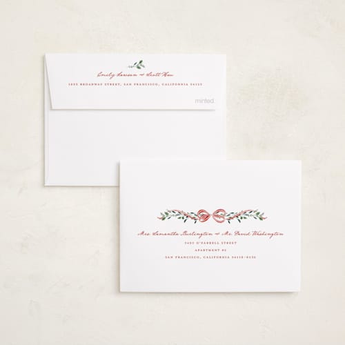 This is a peppermint petite holiday cards with standard by Leah Bisch called arch garland printing on recycled smooth signature in petite