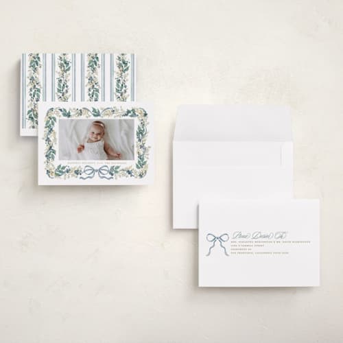 This is a blueberry petite holiday cards with standard by Jackie Crawford called watercolor bow garland printing on recycled smooth signature in petite