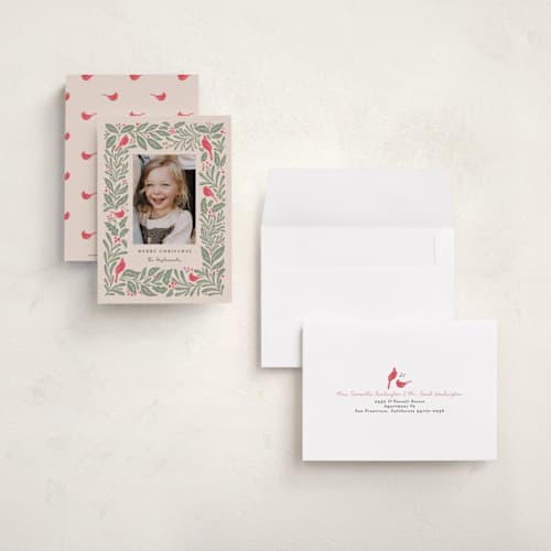 This is a cream petite holiday cards with standard by Kristen Knechtel called cardinals printing on recycled smooth signature in petite