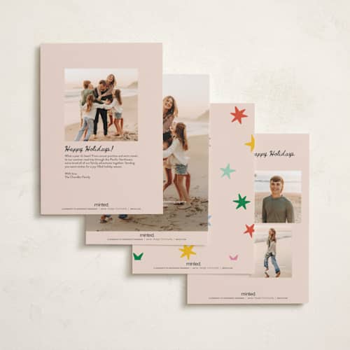 This is a pink sky petite holiday cards with standard by Kristen Magee called star pop printing on signature in petite