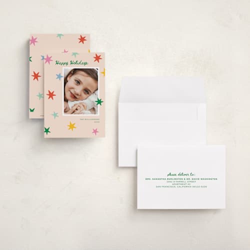This is a pink sky petite holiday cards with standard by Kristen Magee called star pop printing on signature in petite