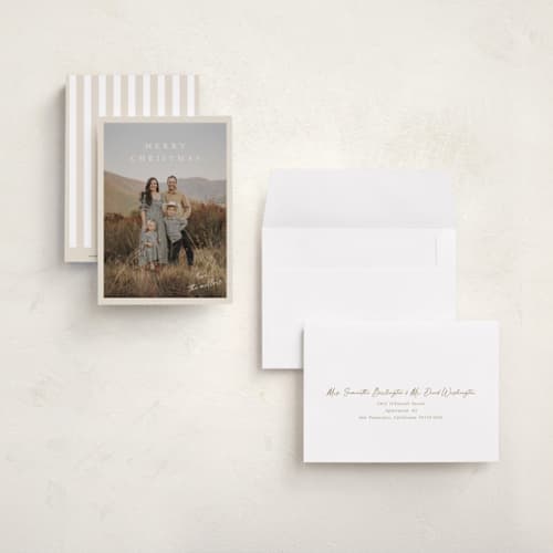 This is a vanilla petite holiday cards with standard by Kasia Labocki called homebound printing on signature in petite
