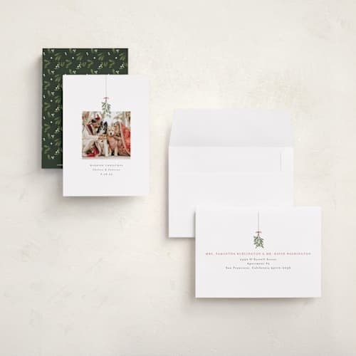 This is a winter petite holiday cards with standard by Randi Cirelli called married and merry printing on recycled smooth signature in petite