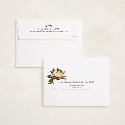 This is a wintermint petite holiday cards with standard by Wendy Keller called magnolias printing on signature in petite