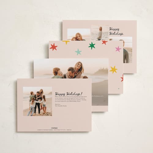 This is a pink sky petite holiday cards with standard by Kristen Magee called star pop printing on signature in petite