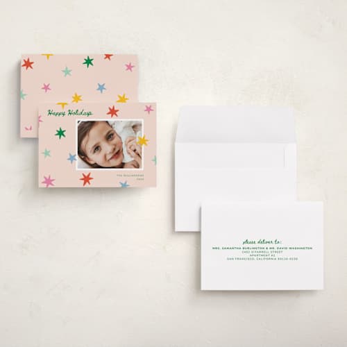 This is a pink sky petite holiday cards with standard by Kristen Magee called star pop printing on signature in petite