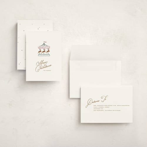 This is a snowflake petite holiday cards with standard by Leia Matt called holiday spin printing on signature in petite