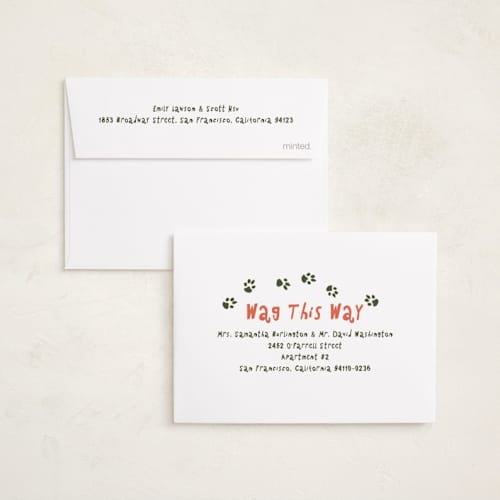 This is a cranberry petite holiday cards with standard by Vera Lim called doggy merry printing on signature in petite