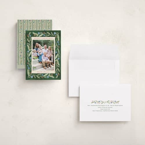 This is a pine petite holiday cards with standard by Amy Kross called verdant printing on signature in petite