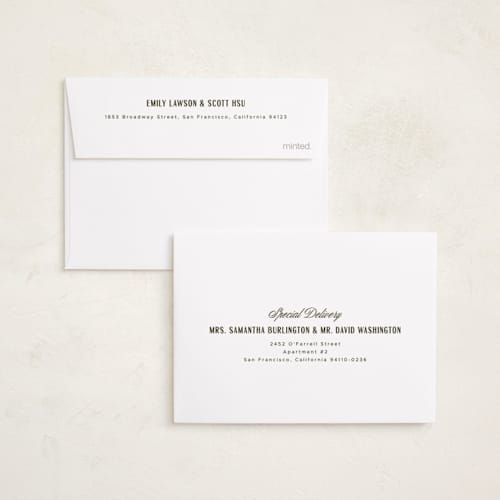 This is a ivory petite holiday cards with standard by Ana de Sousa called just married & merry printing on signature in petite