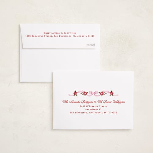 This is a gumdrop petite holiday cards with standard by Sarah Knight called poinsettia ribbon printing on signature in petite