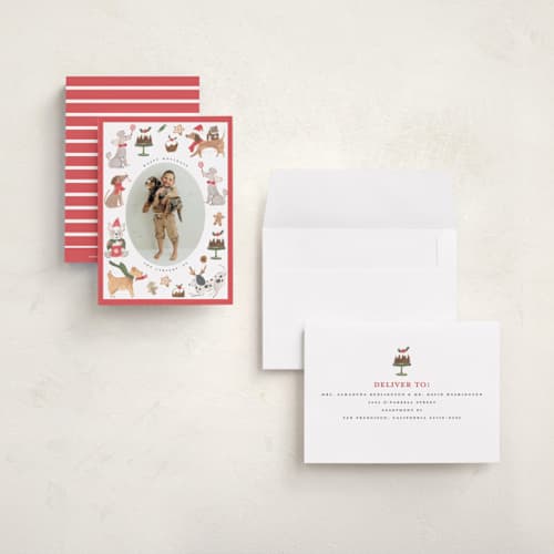 This is a berry petite holiday cards with standard by Teju Reval called festive dogs printing on signature in petite