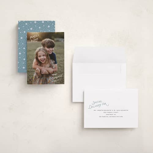 This is a frost petite holiday cards with standard by Hooray Creative called whimsical type printing on signature in petite