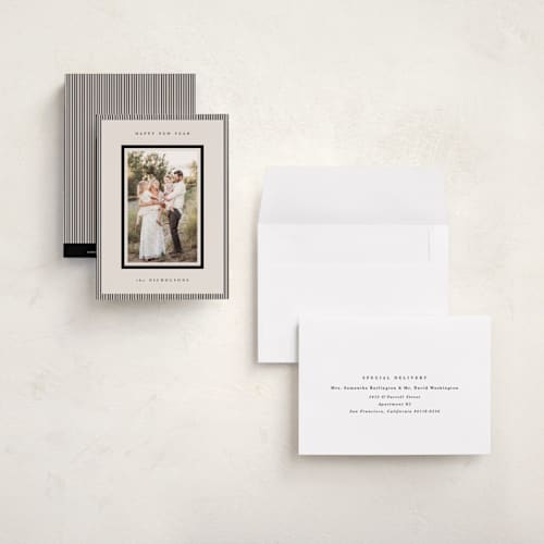 This is a linen petite holiday cards with standard by Kelly Schmidt called striped border printing on recycled smooth signature in petite