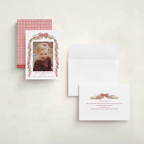This is a stocking petite holiday cards with standard by Sarah Knight called gingham ribbon garland printing on signature in petite