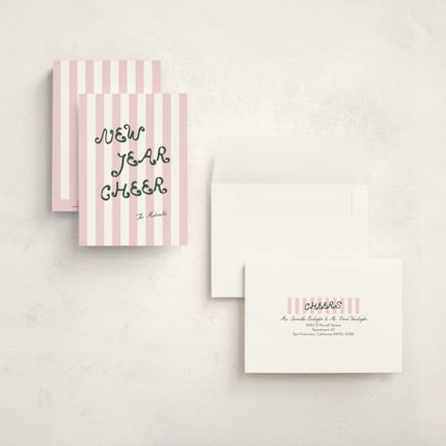 This is a rose petite holiday cards with standard by Angela Garrick called curly font printing on signature in petite