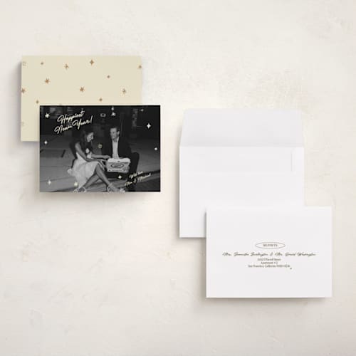 This is a champagne petite holiday cards with standard by Helena Vitto called shiny happy people printing on recycled smooth signature in petite