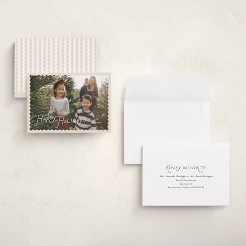 This is a cream petite holiday cards with standard by Pixel and Hank called waved printing on signature in petite