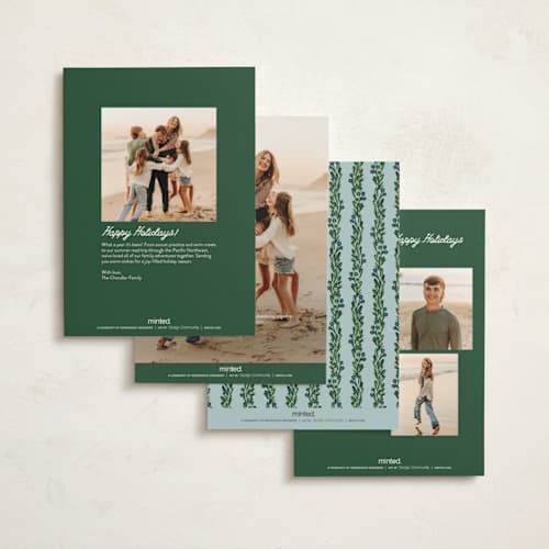 This is a garland petite holiday cards with standard by Claudia Orengo called mistletoe printing on signature in petite