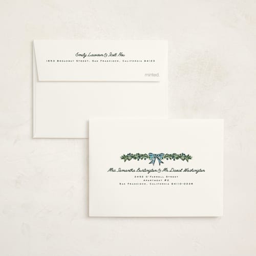 This is a garland petite holiday cards with standard by Claudia Orengo called mistletoe printing on signature in petite