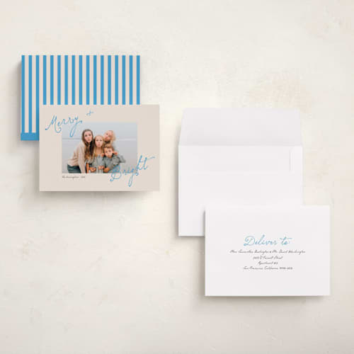 This is a electric blue petite holiday cards with standard by Morgan Kendall called topsy turvy printing on signature in petite