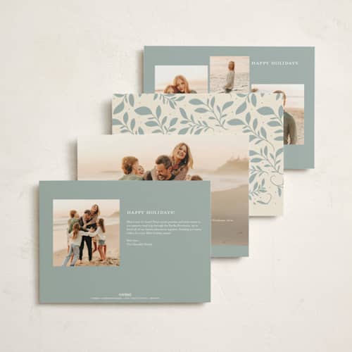 This is a blue spruce foil pressed holiday cards with foil pressed by Erin German called botanical peace on earth printing on signature in standard