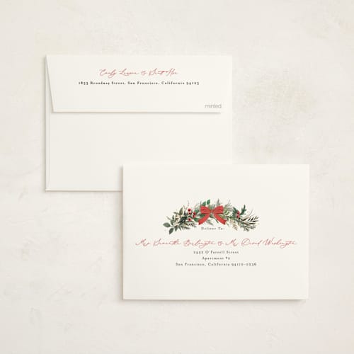 This is a holly berry foil pressed holiday cards with foil pressed by Susan Moyal called festive holiday printing on signature in standard