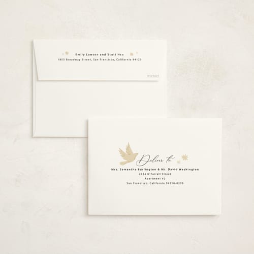 This is a pine foil pressed holiday cards with foil pressed by Hannah Williams called peace dove arch printing on signature in standard