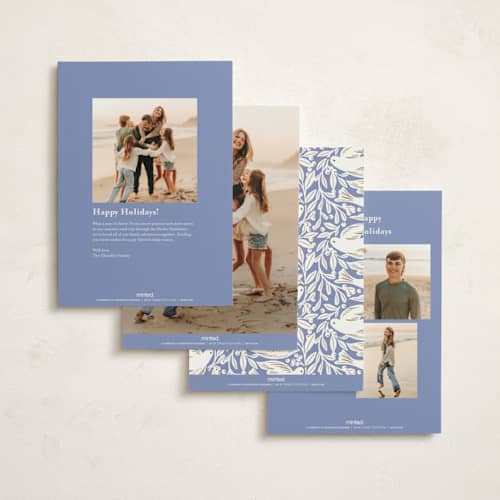 This is a periwinkle foil pressed holiday cards with foil pressed by Alethea and Ruth called peace on earth birds printing on signature in standard