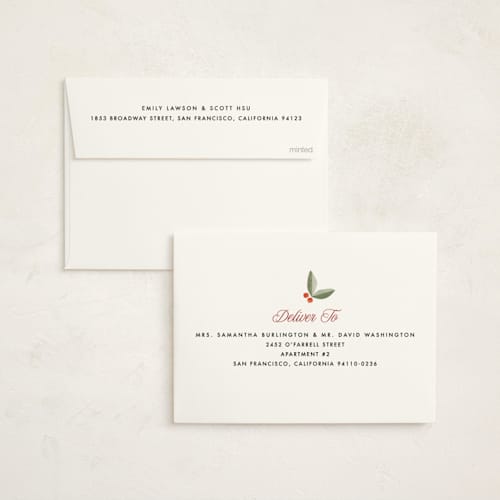 This is a wreath foil pressed holiday cards with foil pressed by Robert and Stella called striped type printing on signature in standard