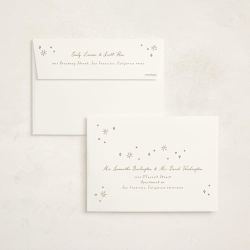 This is a cosmo foil pressed holiday cards with foil pressed by Erin German called festive spirit printing on signature in standard