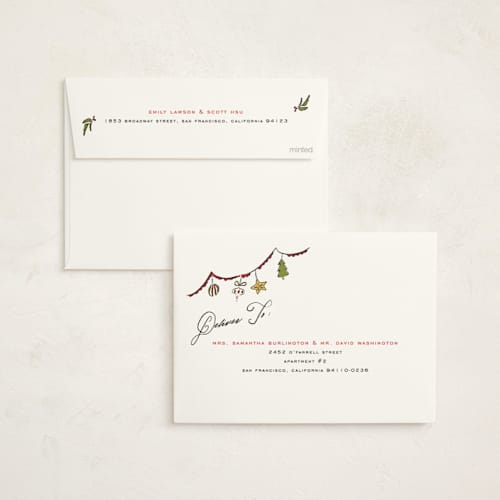 This is a holly berry non photo holiday cards with standard by Sarah Rosenthal called garland cheer printing on signature in standard