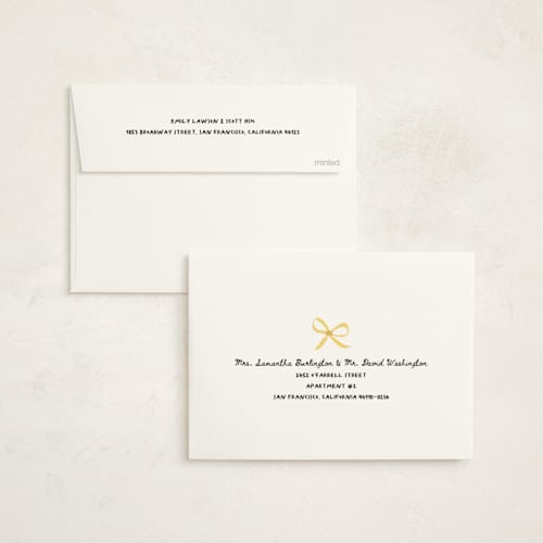 This is a champagne non photo holiday cards with standard by Kamala Nahas called cheers printing on signature in standard