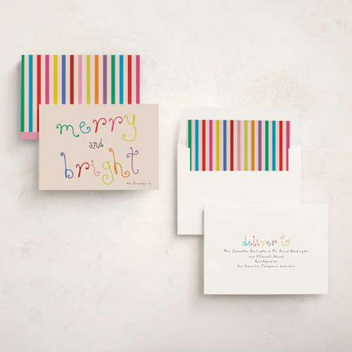 This is a blush non photo holiday cards with standard by Morgan Kendall called playful letters printing on signature in standard