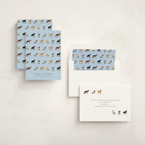 This is a ice non photo holiday cards with standard by tara berg called holiday dogs printing on signature in standard