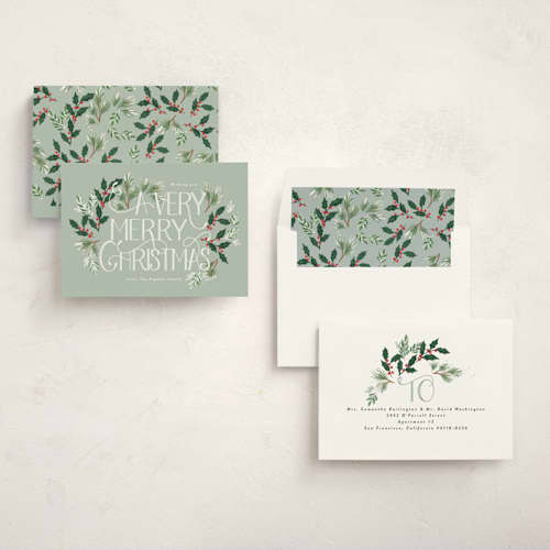 This is a mint non photo holiday cards with standard by Rebecca Durflinger called a very merry christmas botanicals printing on signature in standard