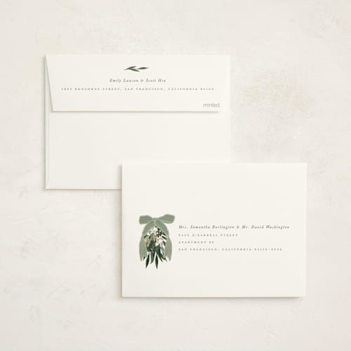 This is a sage non photo holiday cards with standard by Leah Bisch called big bow printing on signature in standard