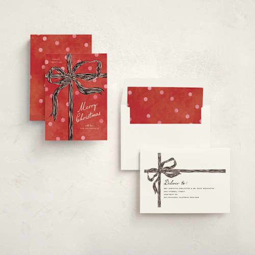 This is a holly non photo holiday cards with standard by Pixel and Hank called bow printing on signature in standard